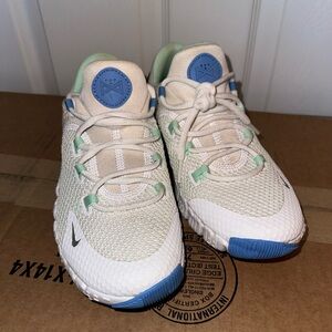 Women’s White and Blue Nikes